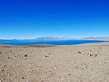 30 Lake Rakshas Tal From Ridge Between Lake Manasarovar And Lake Rakshas Tal To the west of Lake Manasarovar is Lake Rakshas Tal, shaped like a crescent, but thought of as darkness as opposed to the brightness of Manasarovar.